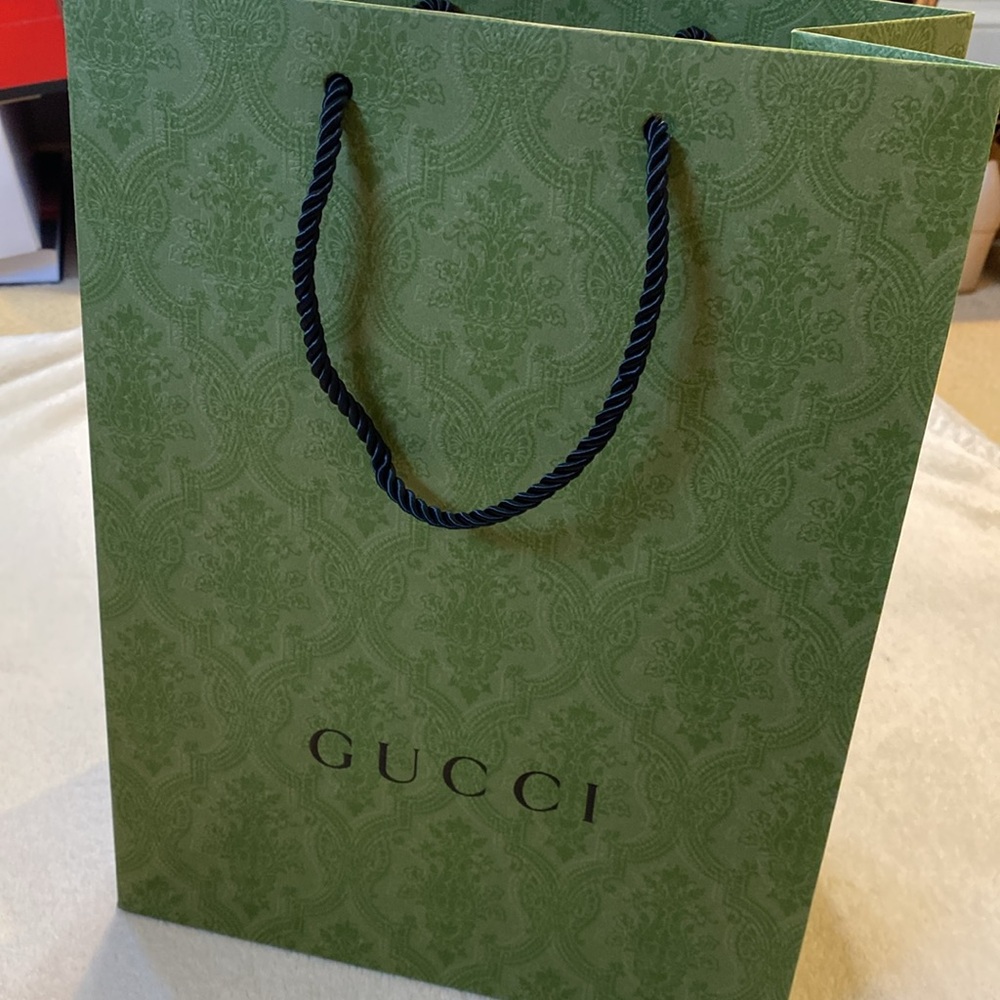GUCCI empty brocade paper shopping bag with black rope handles. Pristine